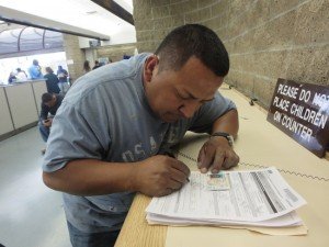 Mr. Flores, renewing his license at the Los Angeles DMV.